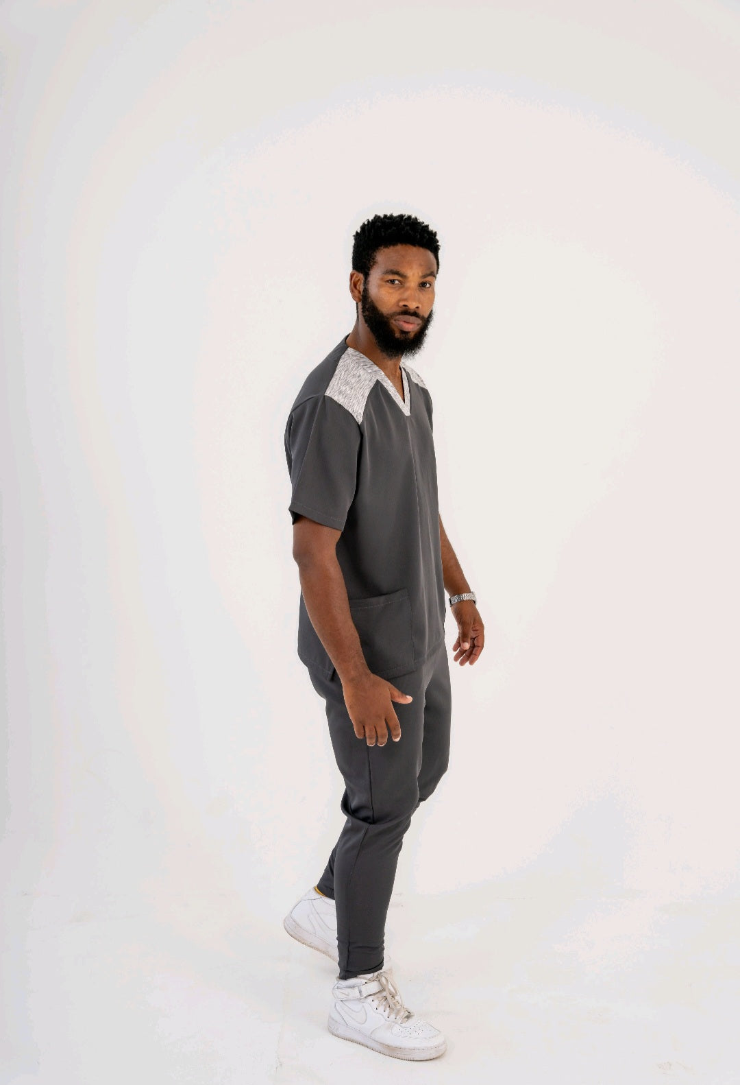 Dynamic Duo: Sporty Two-Tone V-Neck Scrub Top with Matching Fitted Pants