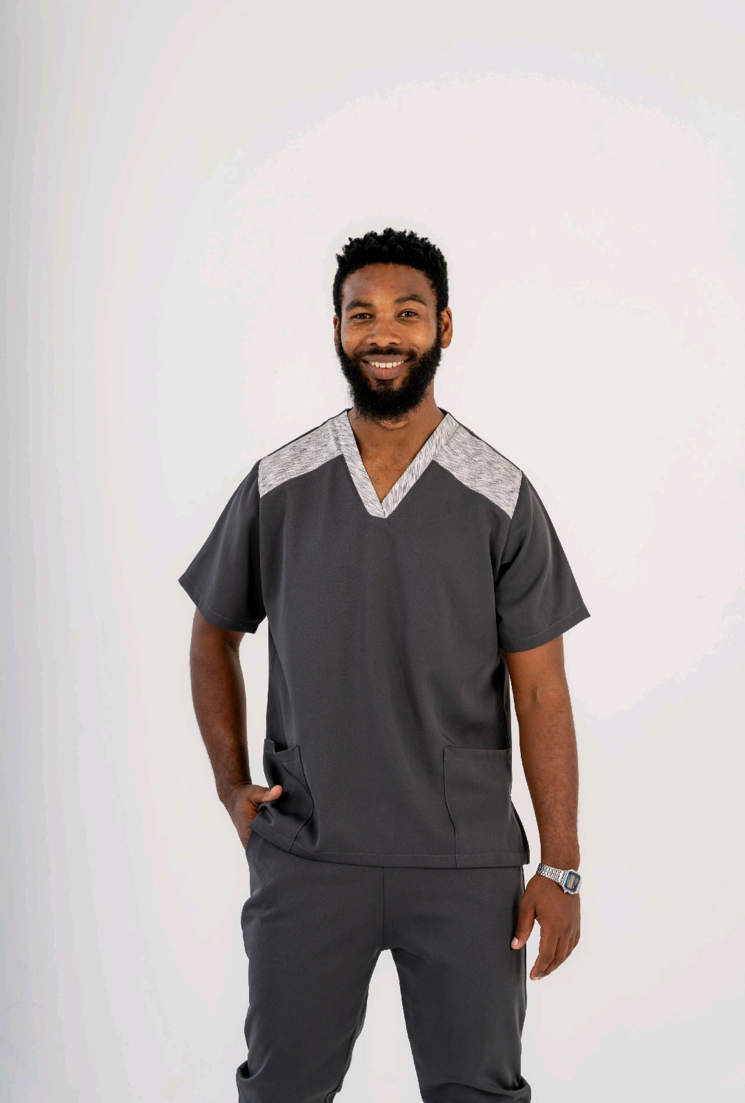 Dynamic Duo: Sporty Two-Tone V-Neck Scrub Top with Matching Fitted Pants